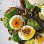 Nutrition - Pastry and Boiled Egg on Plate